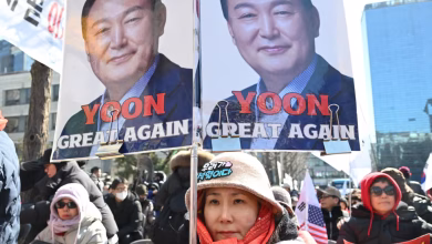 A supporter of Yoon Suk Yeol outside the court in Seoul, South Korea, on Thursday. Photograph: Jung Yeon-Je/AFP/Getty Images