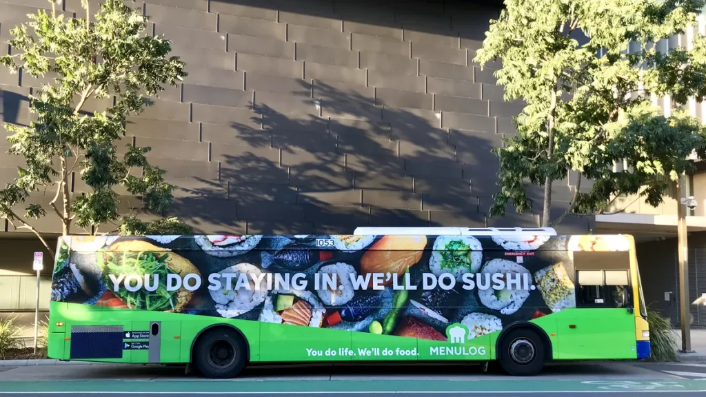 Illustrative: a Menulog advertisement on a Brisbane bus, photographed in July 2018. Menulog ceased Australian operations in November 2025.
