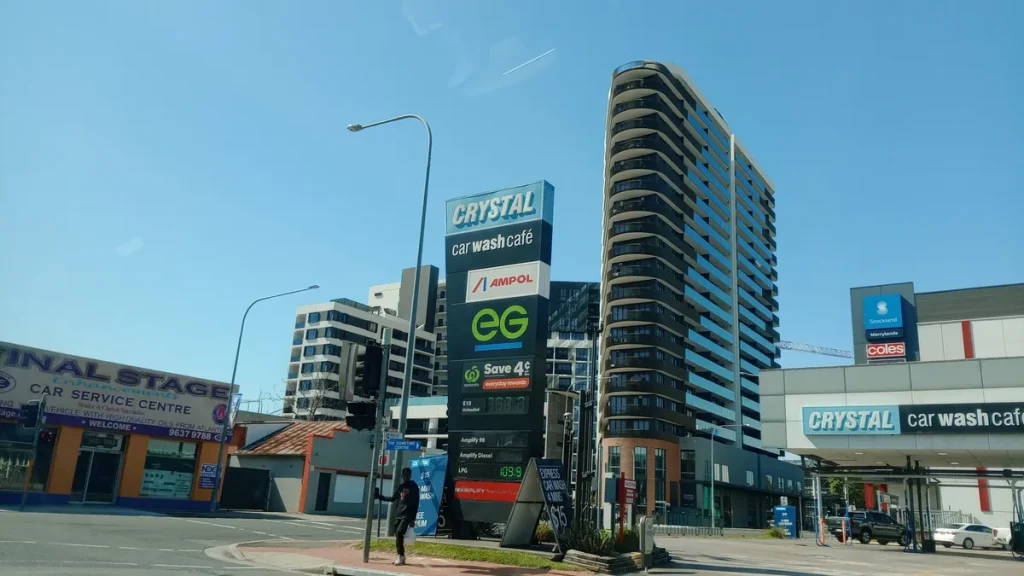 Illustrative: high-rise residential buildings in Merrylands, NSW. The article reports the charging of an 18-year-old over a fatal shooting at Merrylands West on 2 September 2026. Photographed before the incident and not the scene described.